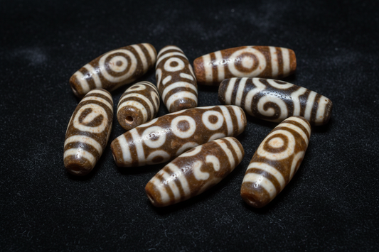Dzi Beads in Tibetan Buddhism: Sacred Agate Guide