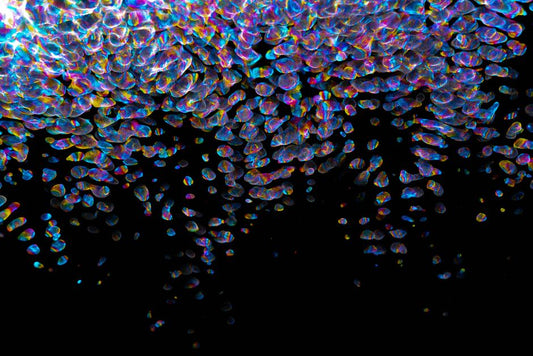 Labradorite's Iridescent Schiller: The Role of Exsolution Lamellae in Feldspar