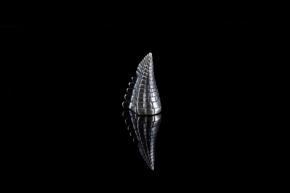Why Specular Hematite Looks Like Polished Metal but Is Not a Metal
