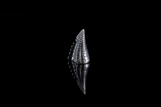 Why Specular Hematite Looks Like Polished Metal but Is Not a Metal