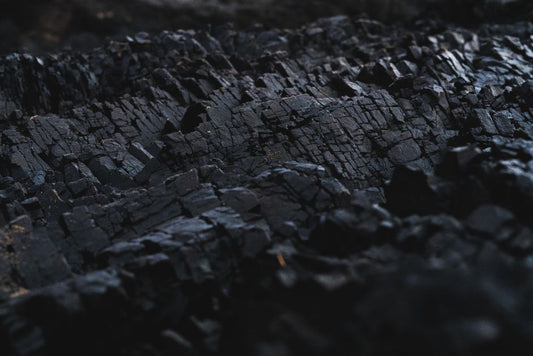 Shungite vs. Carbonado: A Comparative Analysis of Carbon Mineral Formation and Geological Origins