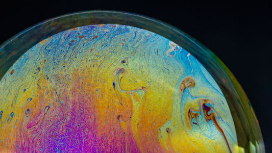 Charoite: Separating Natural Banding from Interference-Induced Iridescence