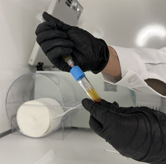 When a Coating Becomes the Measurement: Uncertainty in Testing Coated Topaz