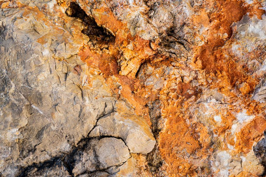 The Geological Rarity of Red Beryl: A Mineralogy Case Study in Pegmatite Formation and Metamorphic Metasomatism