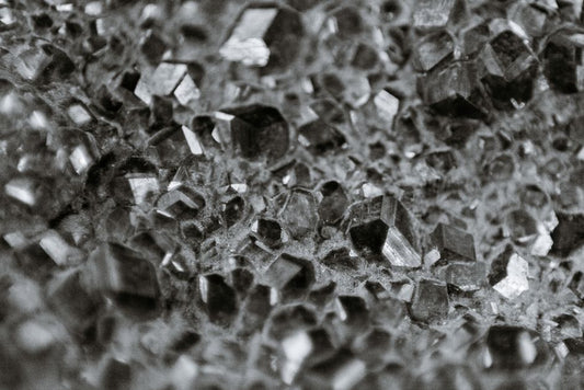 Lab-Grown Grossular Garnet and the Optical Role of Facet Design