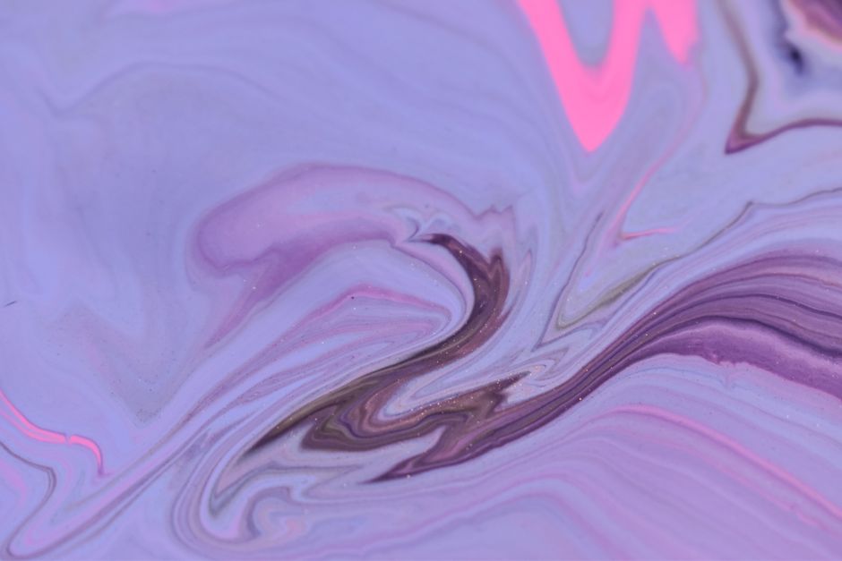 Why Rhodonite's Pink Color Is Often Unexpectedly Uniform in Thin Section