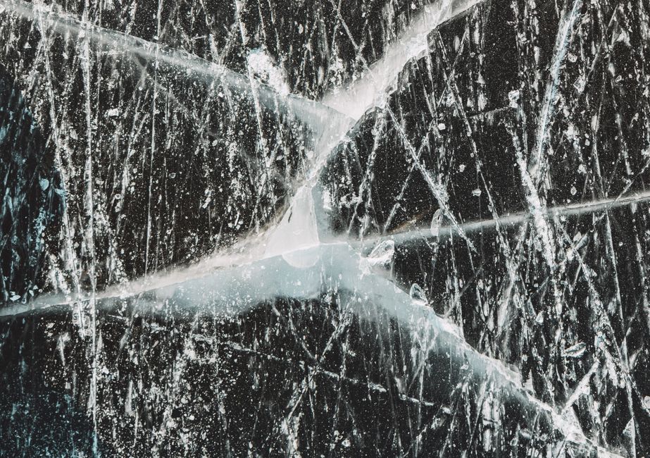 When Hardness Misleads: Synthetic Sapphire, Fracture Mechanics, and the Limits of Scratch Testing