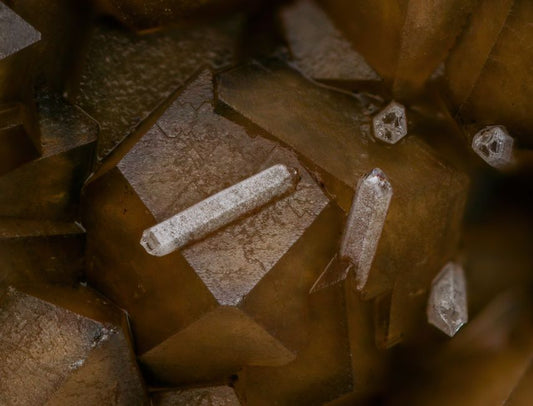 Rhodochrosite: Physical and Optical Properties and Their Varieties